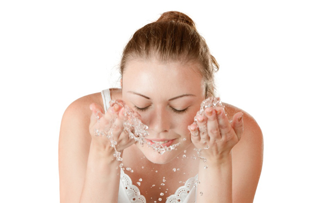 girl washing face Celebrity Esthetician Renee Rouleau Shares Her Best Skin Secrets