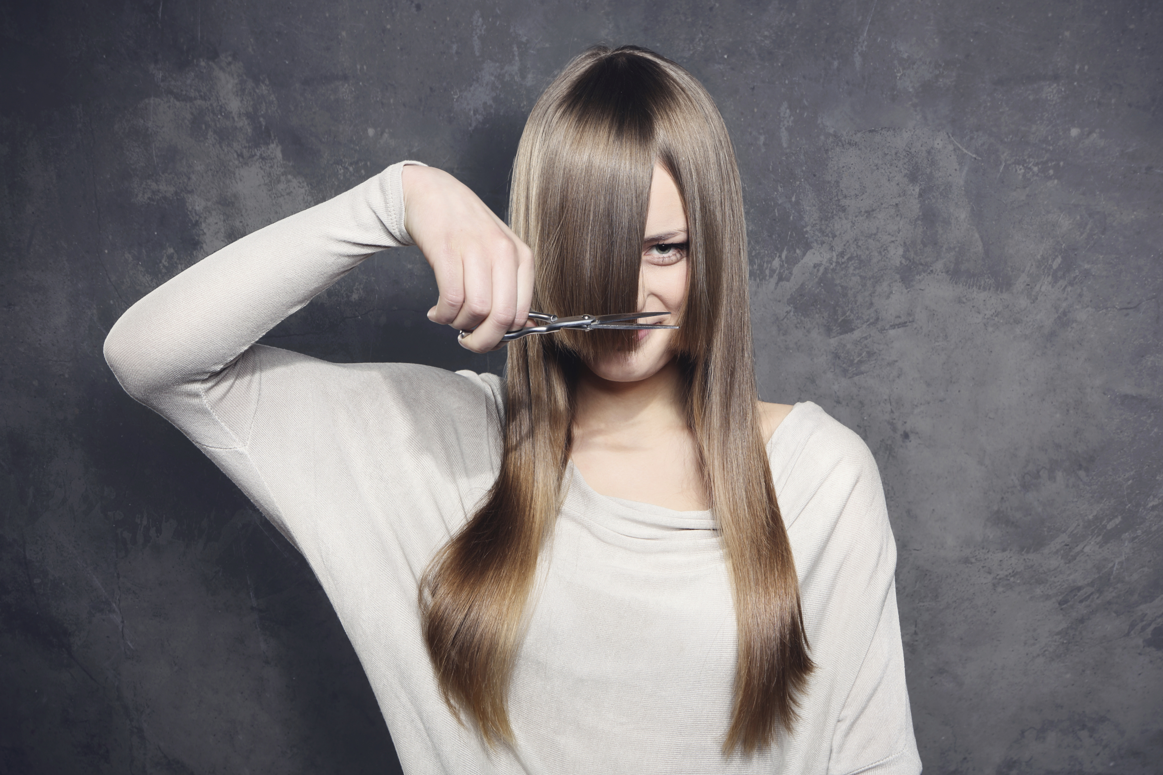 girl cutting hair